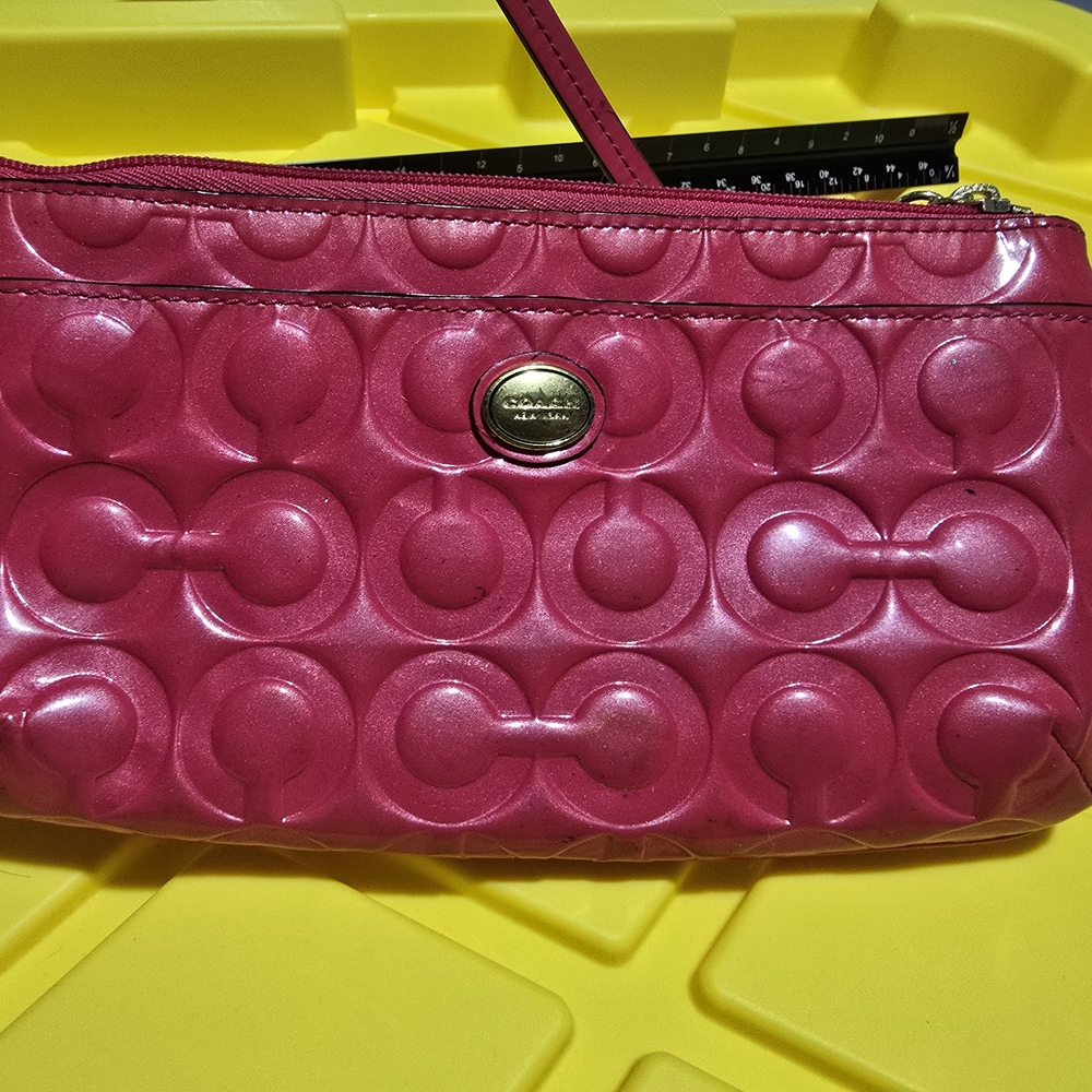 Coach Peyton Signature Embossed Patent Leather Wristlet in hot pink FUC